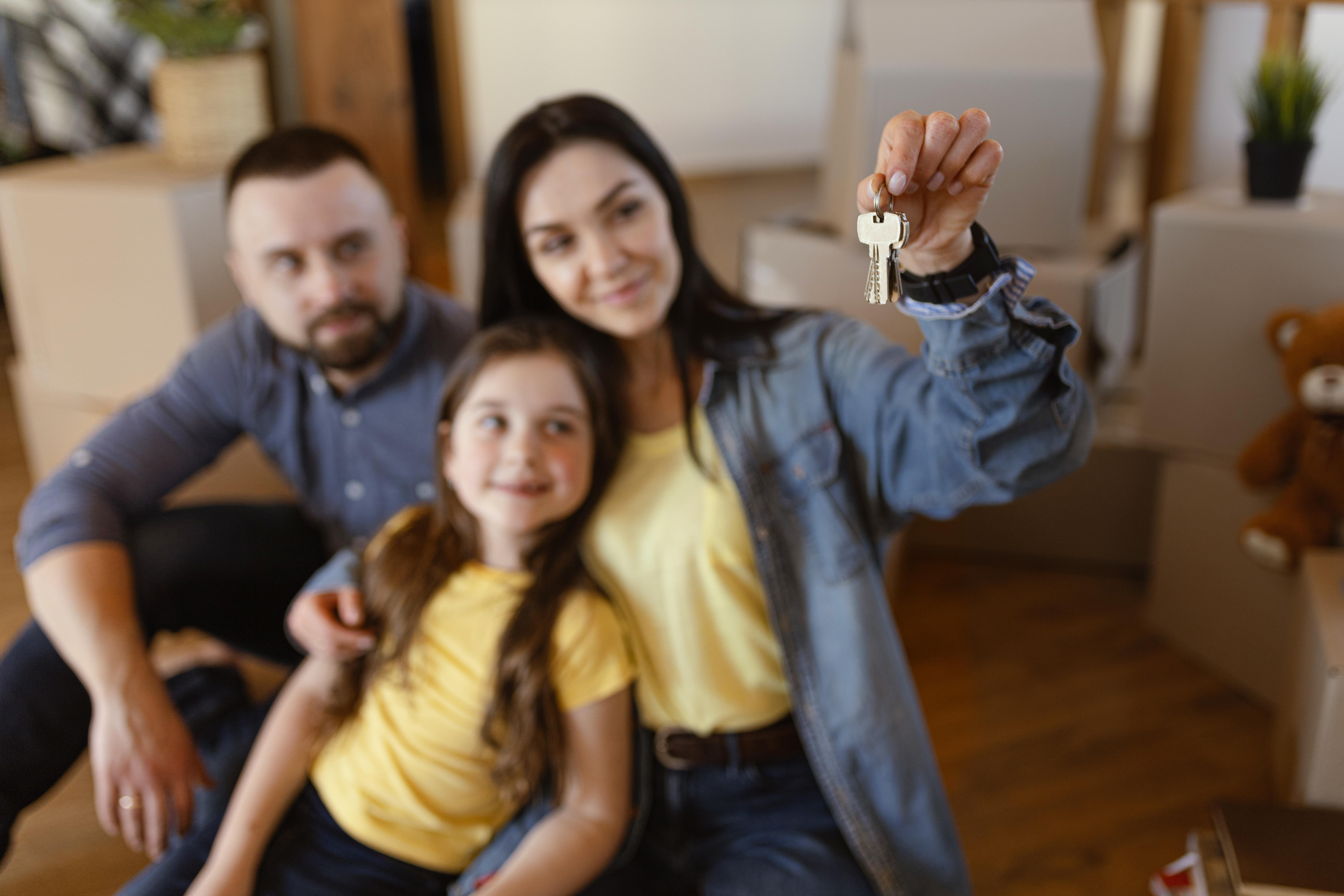 medium-shot-woman-holding-keys